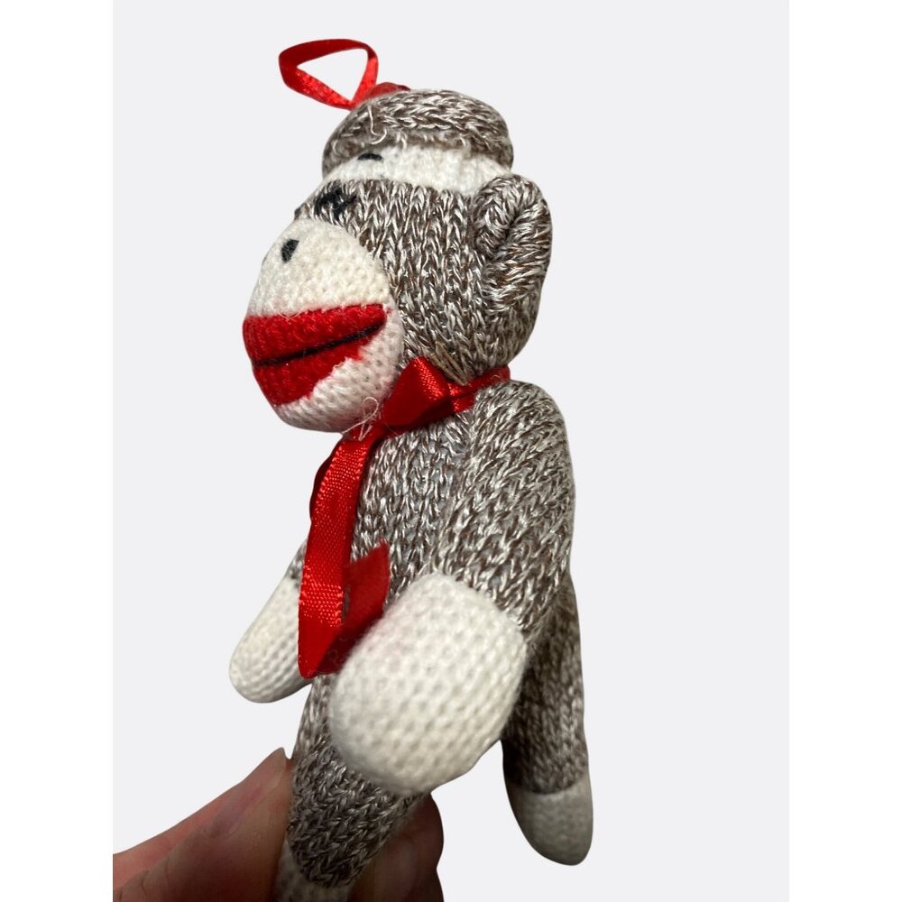 Knitted Sock Monkey Plush Ornament With Red Ribbon - Picture 9 of 10